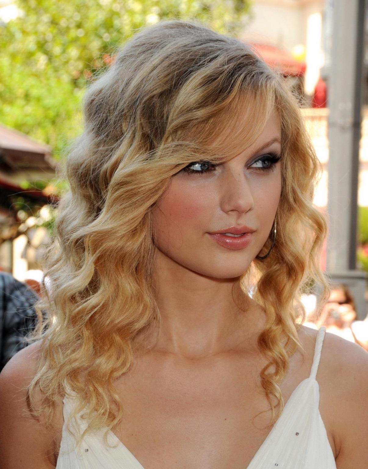 15P Taylor Swift stunning in white dress at 'Another Cinderella Story' premiere