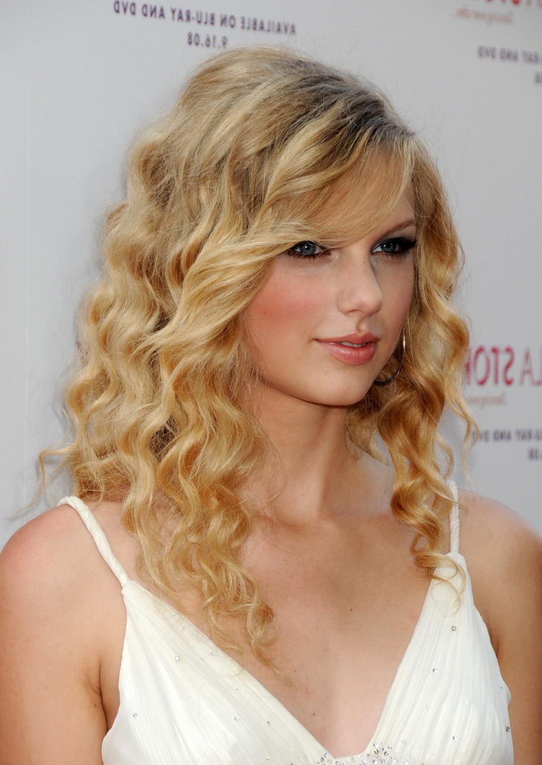 15P Taylor Swift stunning in white dress at 'Another Cinderella Story' premiere