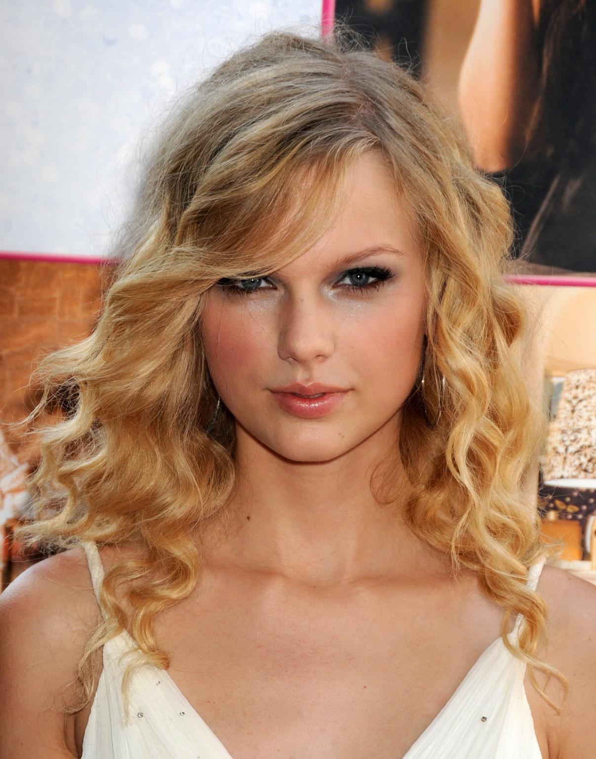 15P Taylor Swift stunning in white dress at 'Another Cinderella Story' premiere