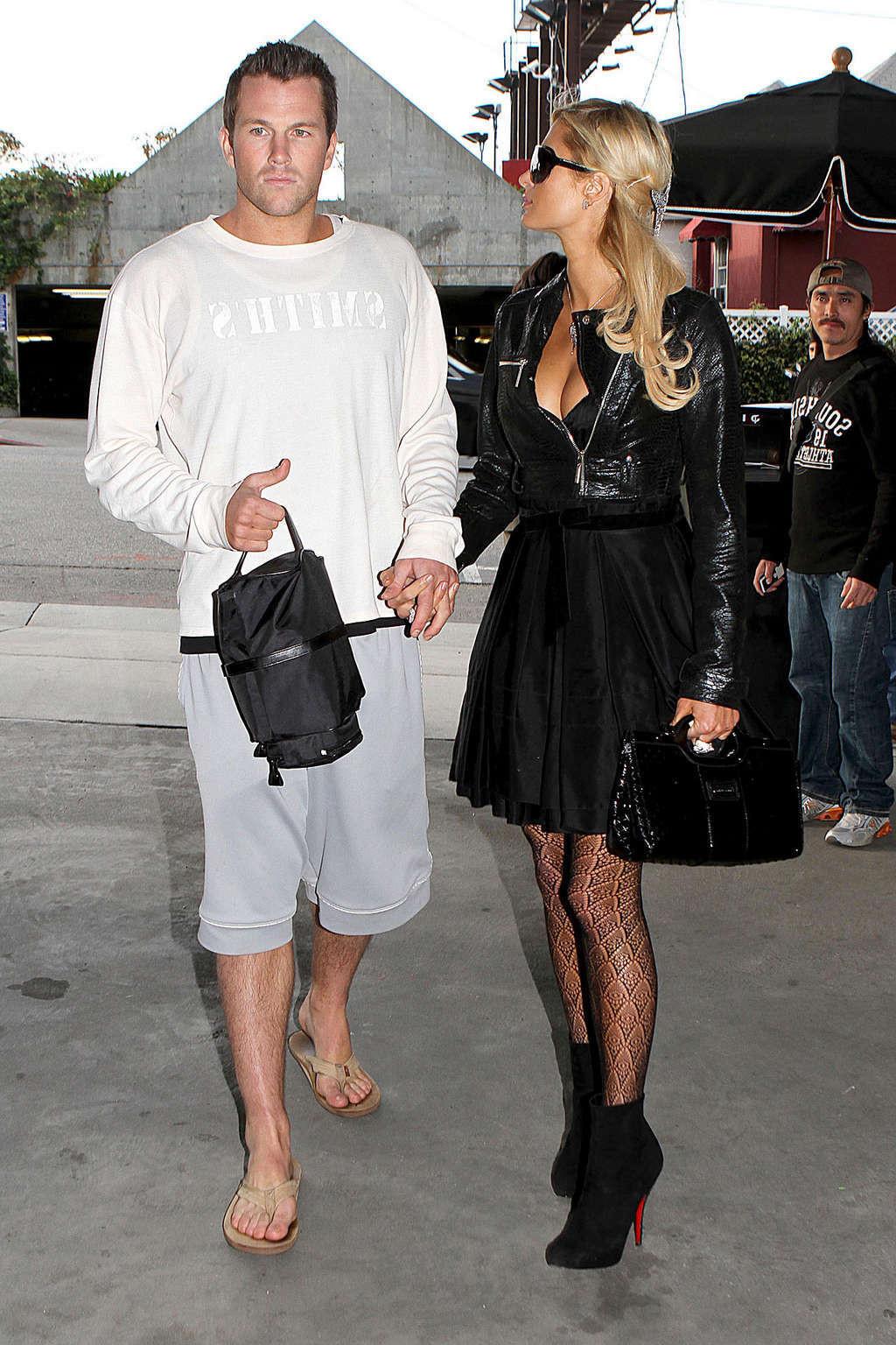 16P Paris Hilton in stockings and dress on street paparazzi shoots