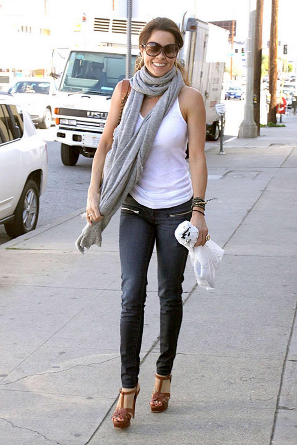 16P Brooke Burke showing her sexy legs in jeans on street