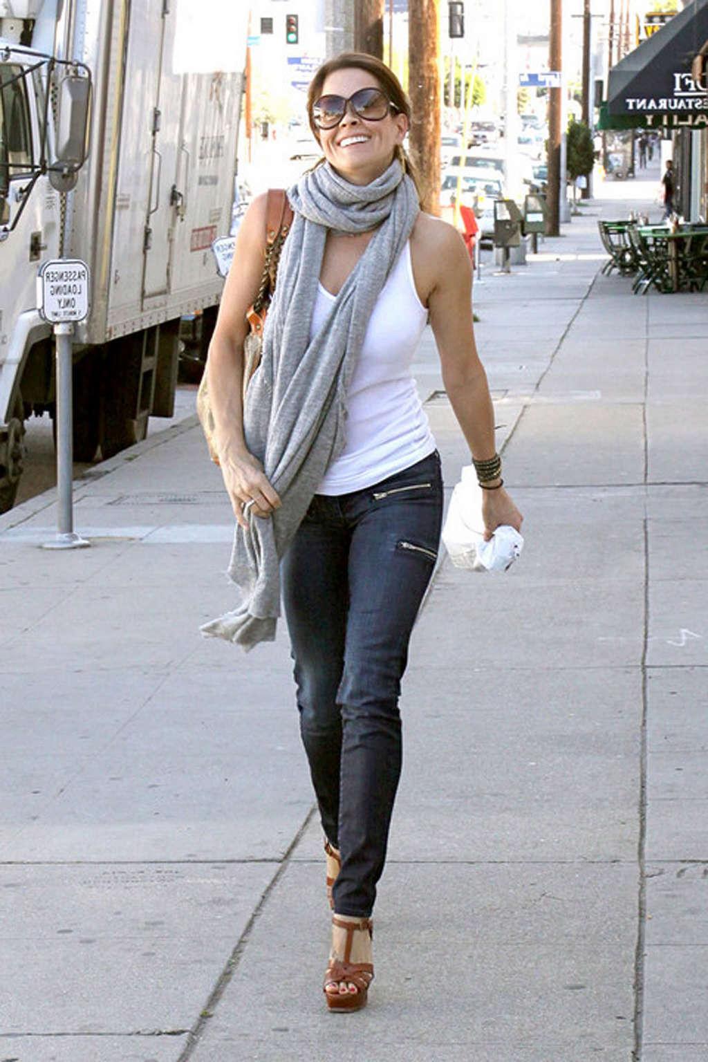 16P Brooke Burke showing her sexy legs in jeans on street