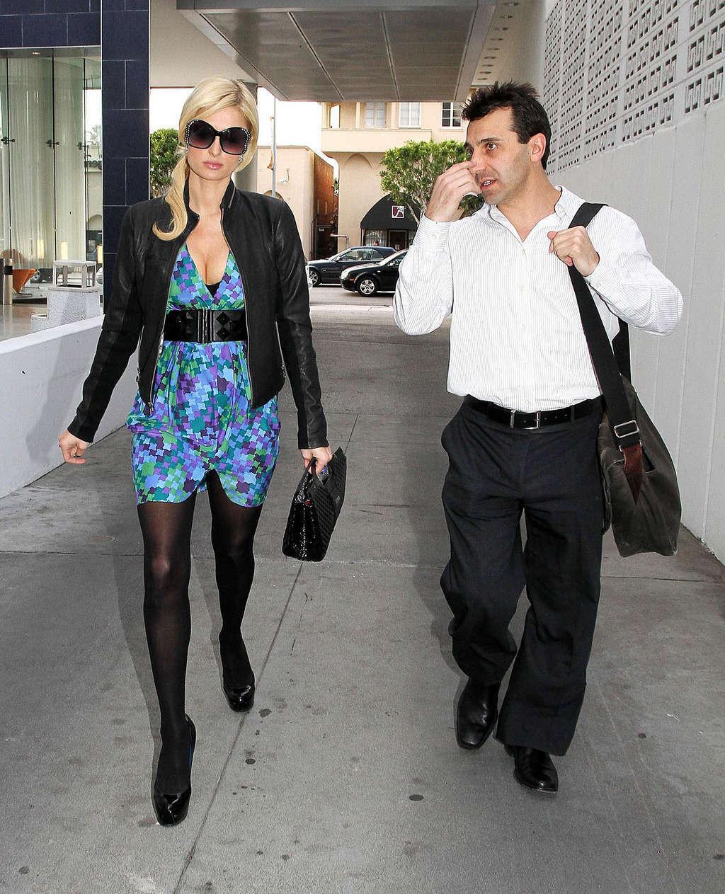 16P Paris Hilton showing her panties upskirt on street and her tits