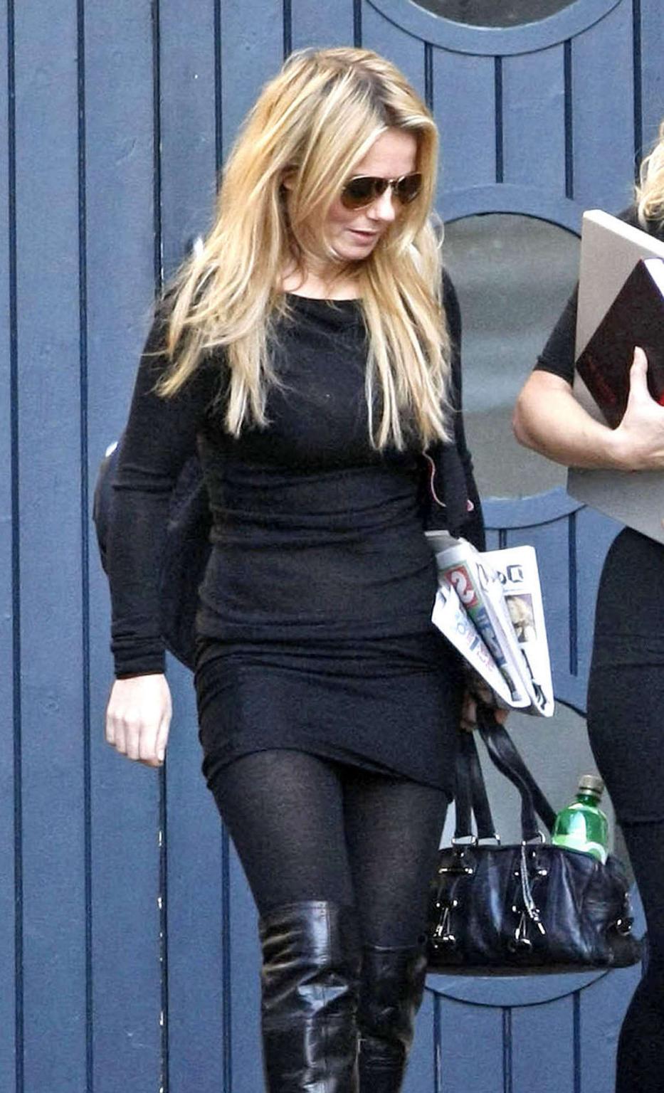 16P Geri Halliwell on street in mini skirt showing her nice ass and sexy legs