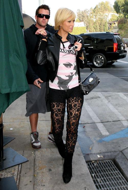 16P Paris Hilton looking very hot in sexy stockings on street