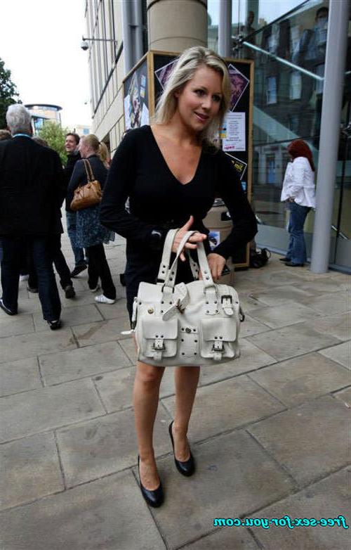 16P Abi Titmuss showing her big tits and posing sexy on street