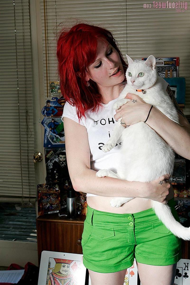 15P Pierced punk girl with tattoos spreads her hairy pussy