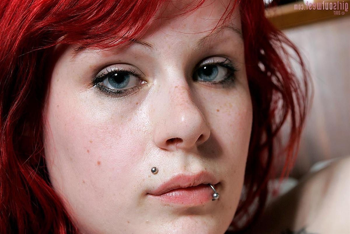 15P Pierced punk girl with tattoos spreads her hairy pussy