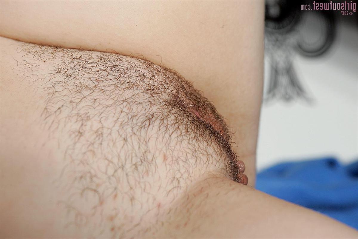 15P Pierced punk girl with tattoos spreads her hairy pussy