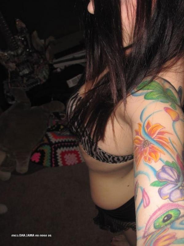 12P Inked rocker chick spreading and showing her shaved twat