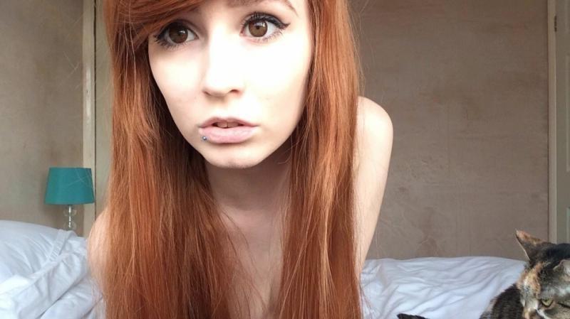 14P Naughty cocktease with body piercings posing naked