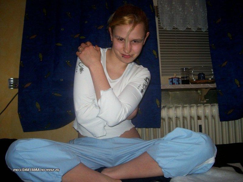 8P Kinky pierced babe shows off her nice round tits