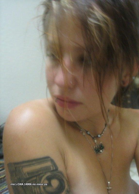 9P Sexy inked chick enjoys flashing her fine tits