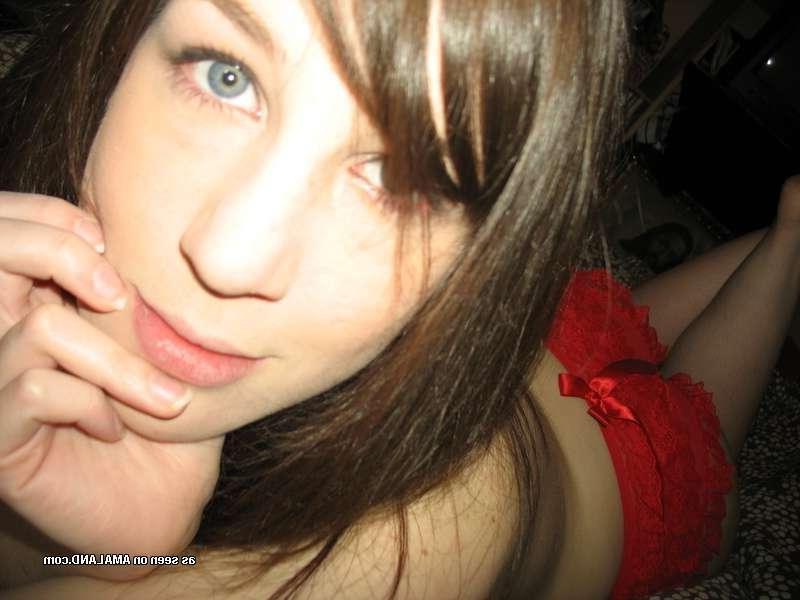 9P Gallery of a sexy inked honey flashing her tits at home