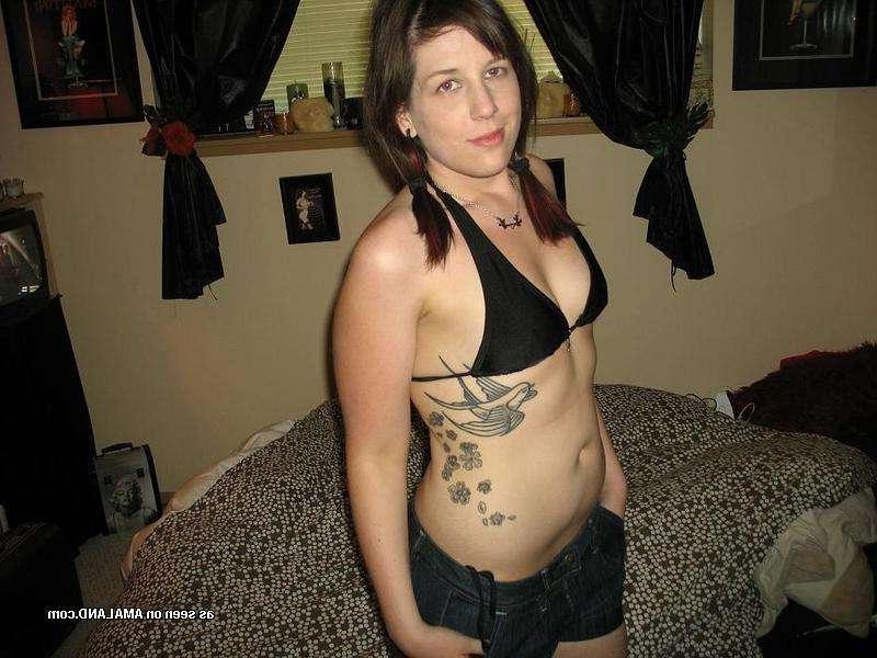 9P Gallery of a sexy inked honey flashing her tits at home