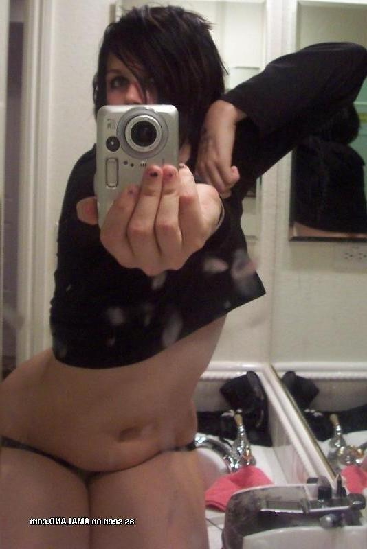 10P Kinky pierced babe showing off her perky tits