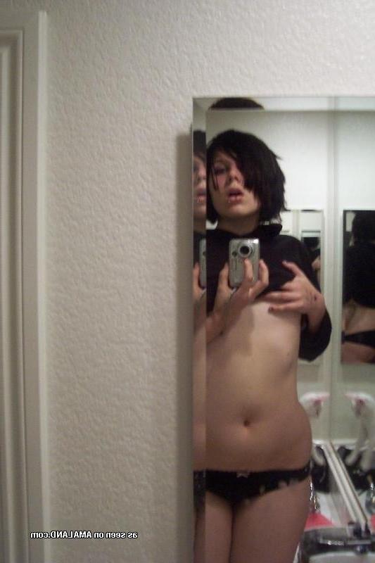 10P Kinky pierced babe showing off her perky tits