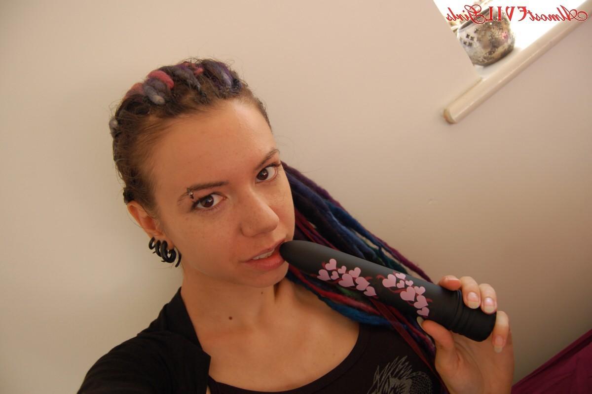 15P Alisha X fucks a big black dildo
