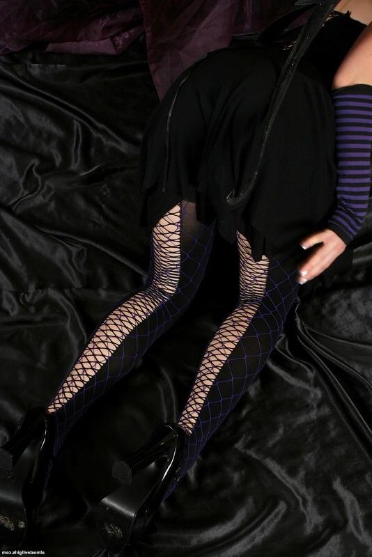 15P Sinful Sprite shows off her pussy and ass