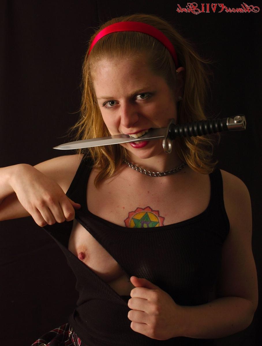 15P Leila Hazlett cuts off her top[ and slices up her stockings to show off her tigh