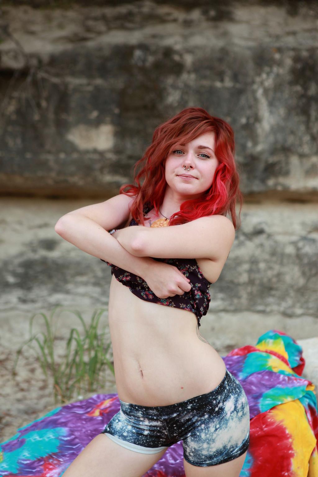 16P Petite redhead girl strips