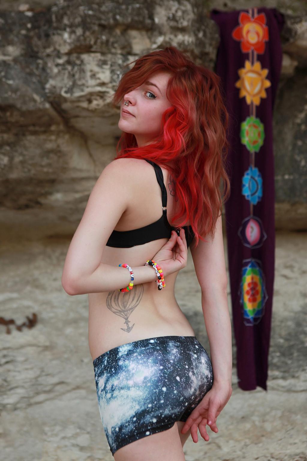 16P Petite redhead girl strips