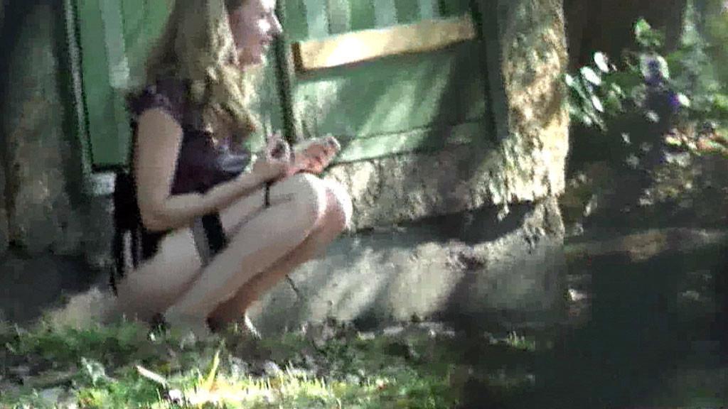 15P Unique hidden camera pics of a chickie doing a piss