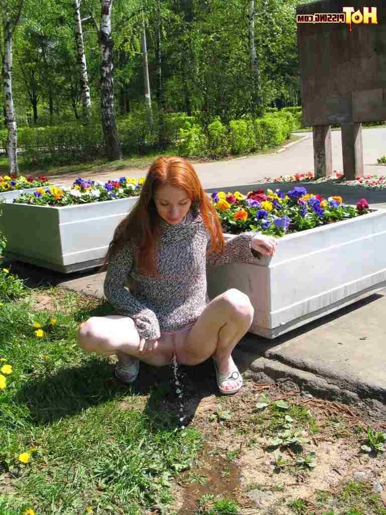 16P Redhead pissing outdoors