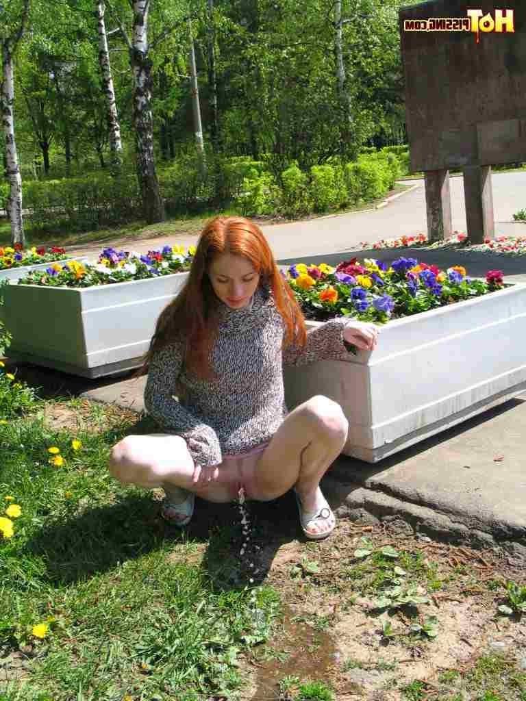 16P Redhead pissing outdoors