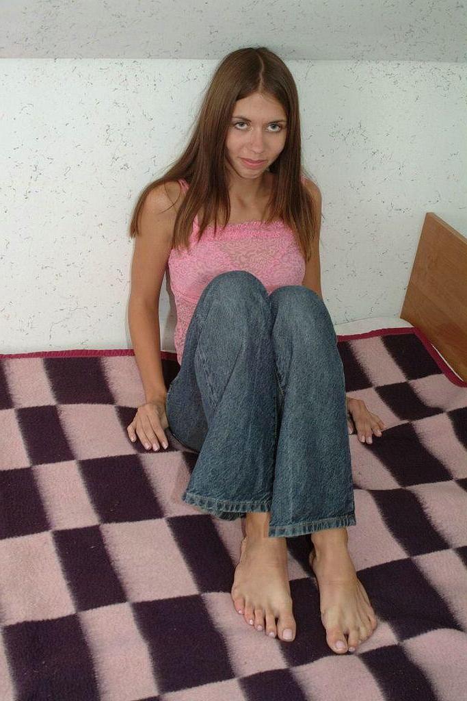 20P Strip teasing sexy feet teen loves spreading her pink pussy