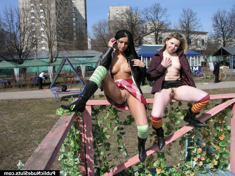15P Two naughty babes displaying their seductive intimate spots in public