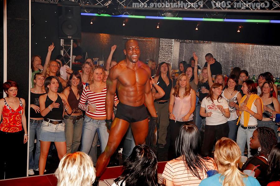 11P Fireman on stage stripping for the ladies