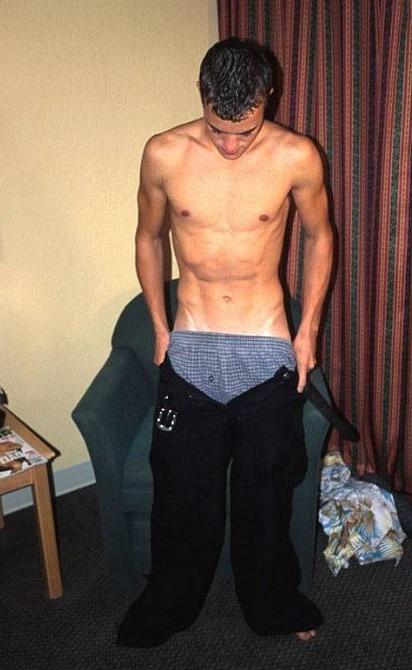 20P Dark haired big cock lad stripping and showing his nice ass