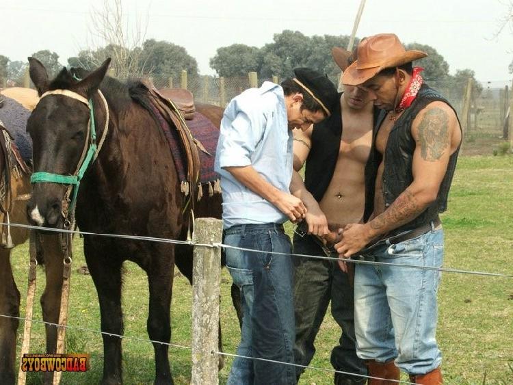 16P Cute guy gets fucked right on the ground taking two big cowboy cocks