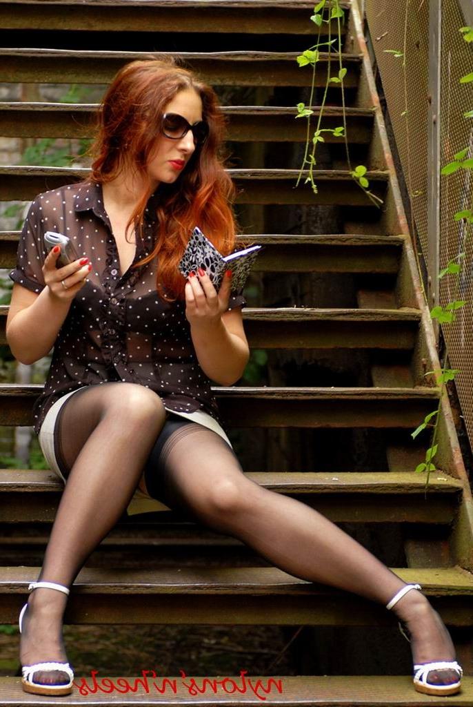 12P Amateur redhead in stockiings outdoors