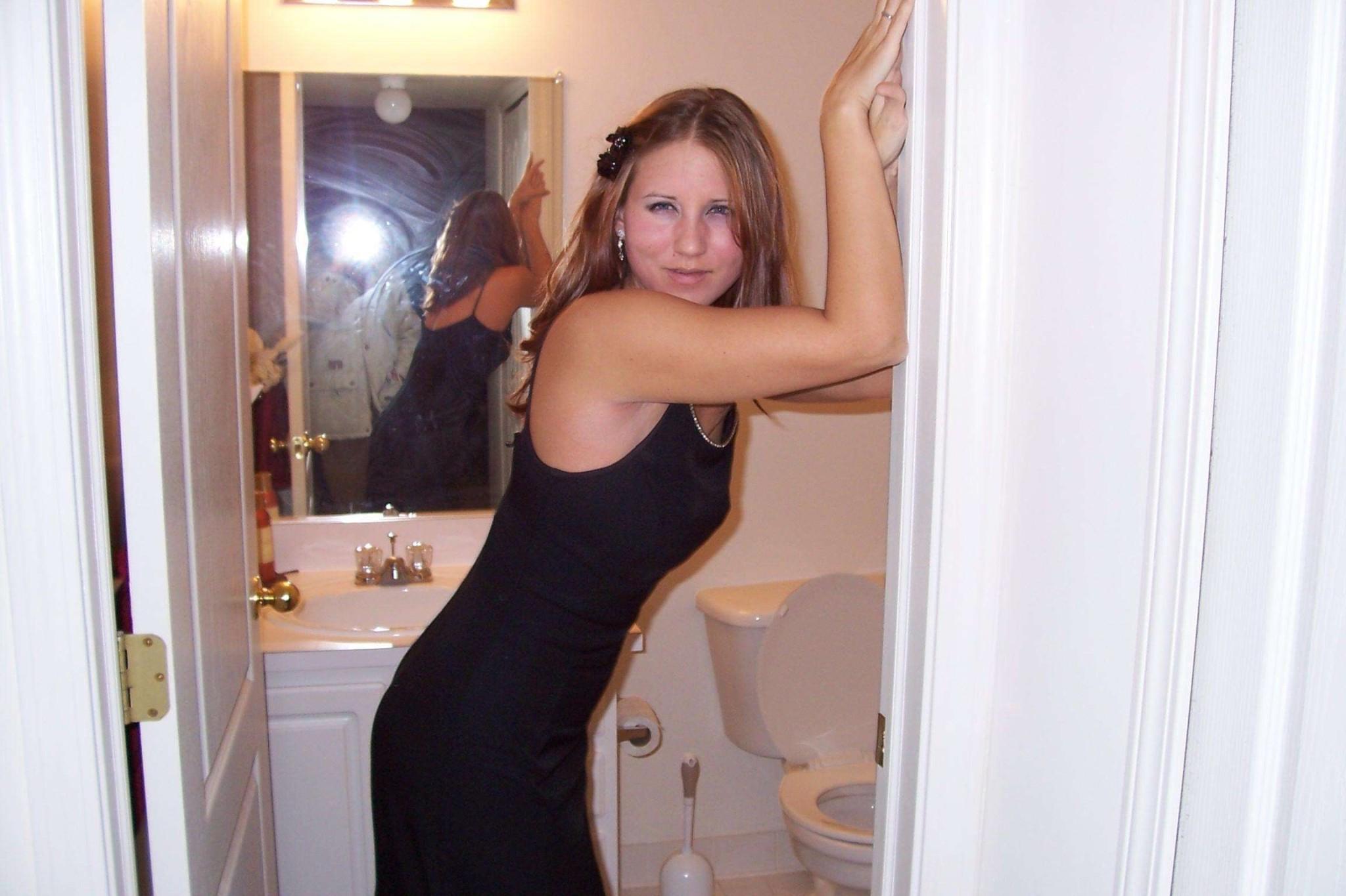 16P Cutie named Daisy strips off her black dress then gets into bed to play with her
