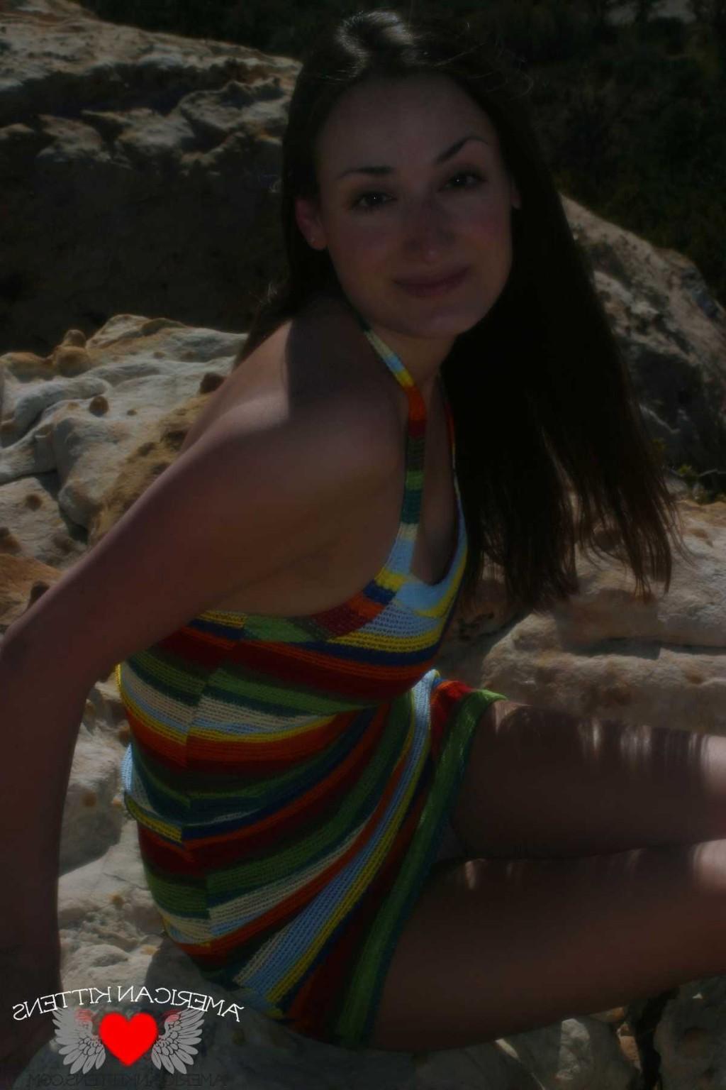 18P Emma outside crazy dress only in Vegas can you see a girl in this thing hiking