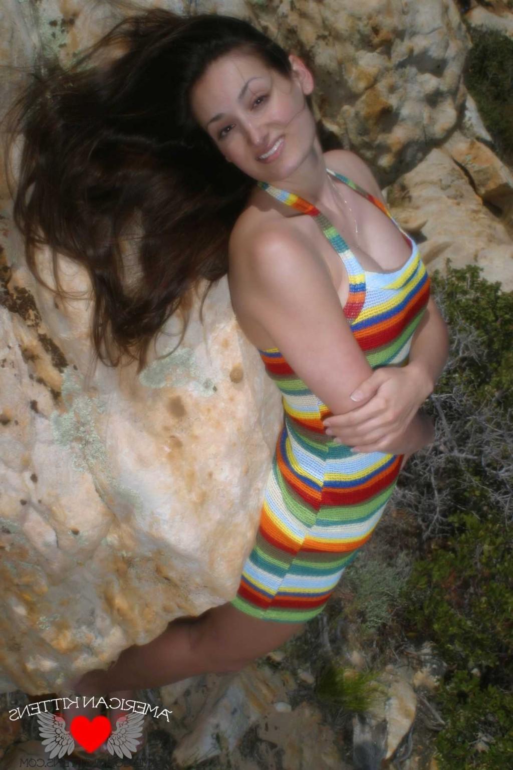 18P Emma outside crazy dress only in Vegas can you see a girl in this thing hiking