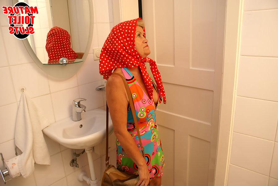 17P big boobed grandmother does blowjob on a stranger in the toilet