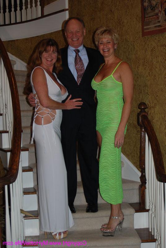 15P A blonde swinger milf showing her goods on a stairway