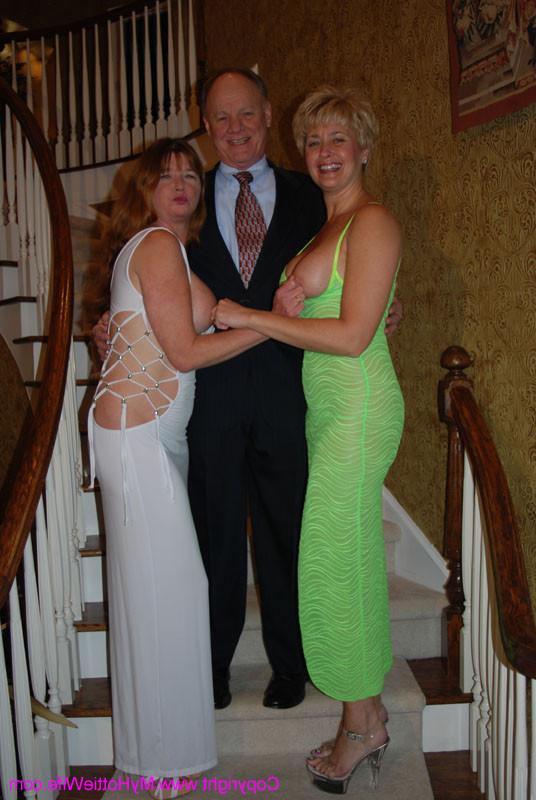 15P A blonde swinger milf showing her goods on a stairway
