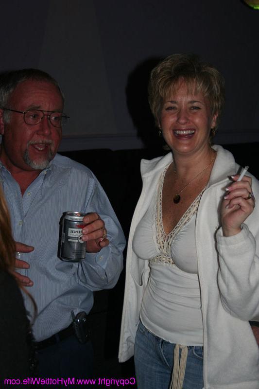 15P Swinger housewifes showing boobs at a party