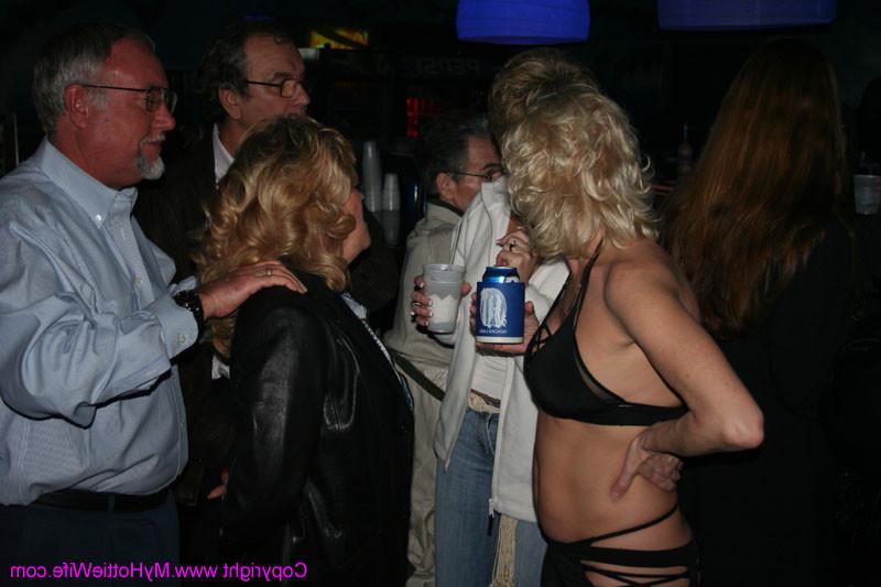 15P Swinger housewifes showing boobs at a party