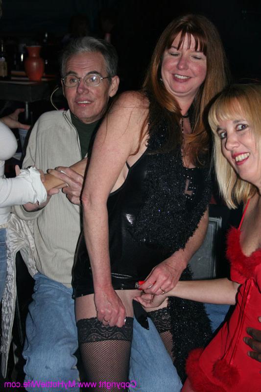 15P Swinger housewifes showing boobs at a party