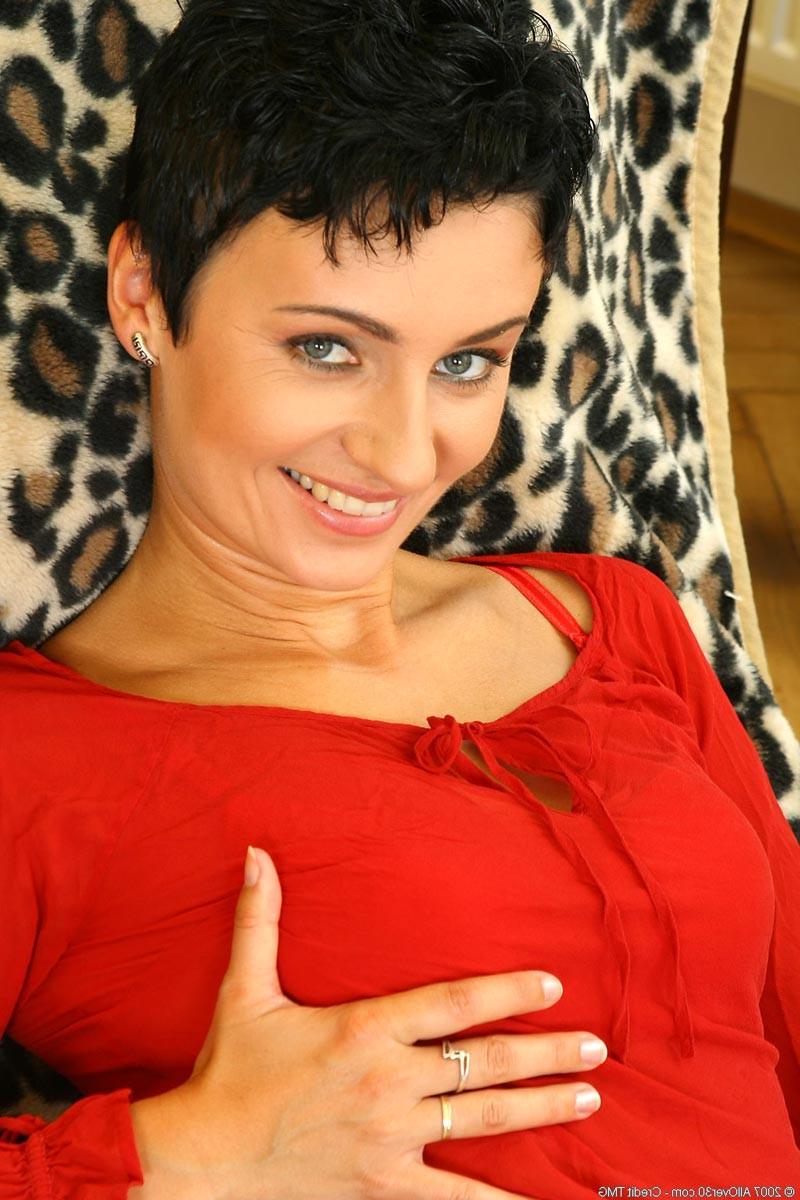 15P Petite brunette milf teasing her pink pussy