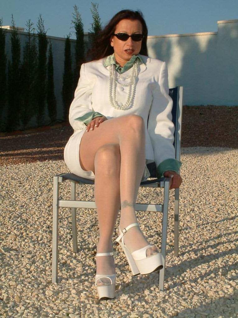 12P Trinity strips stockings and shows yummy pussy