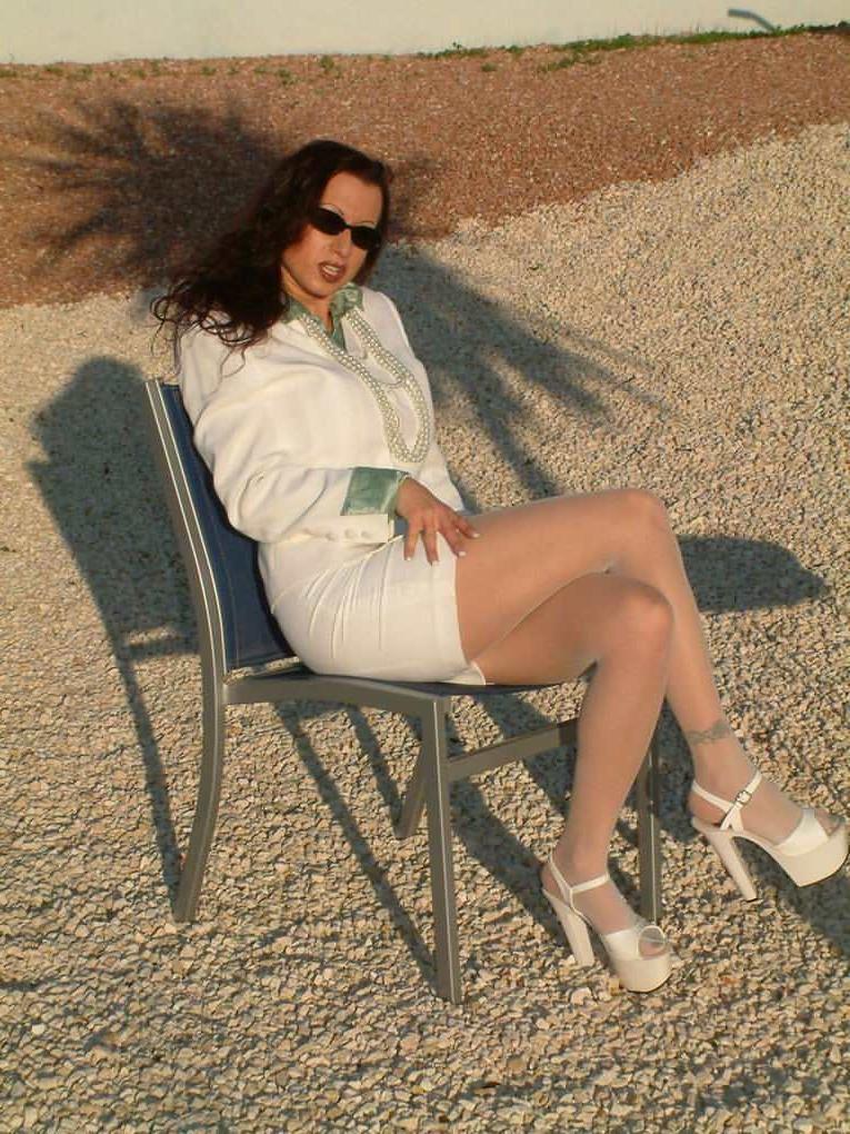 12P Trinity strips stockings and shows yummy pussy