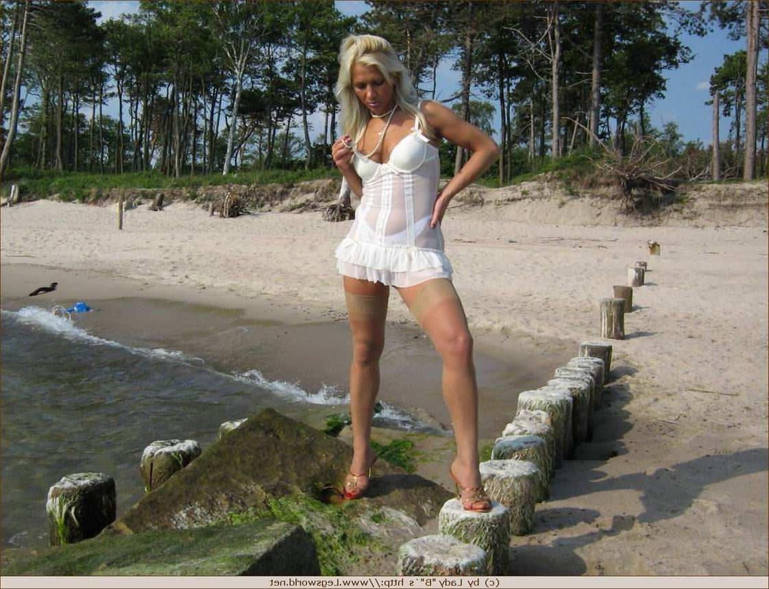 12P Leggy german amateur lady in nylons posing on the beach