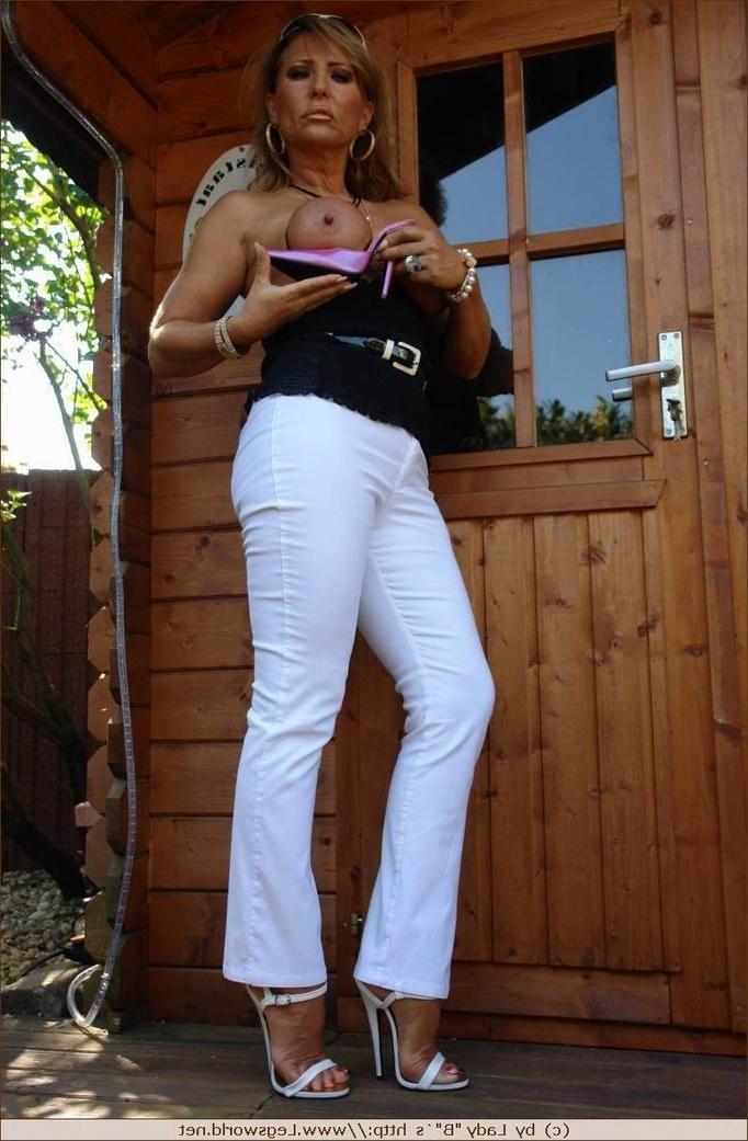 12P Busty german lady teasing with her heels