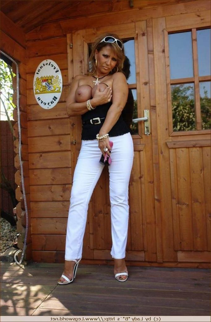 12P Busty german lady teasing with her heels